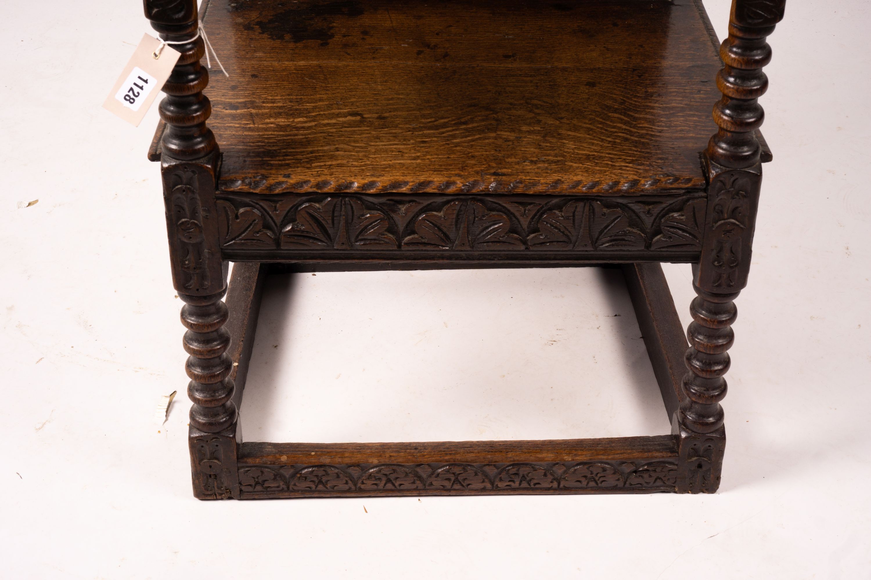 An 18th century style carved oak wainscot chair, width 56cm, depth 60cm, height 101cm